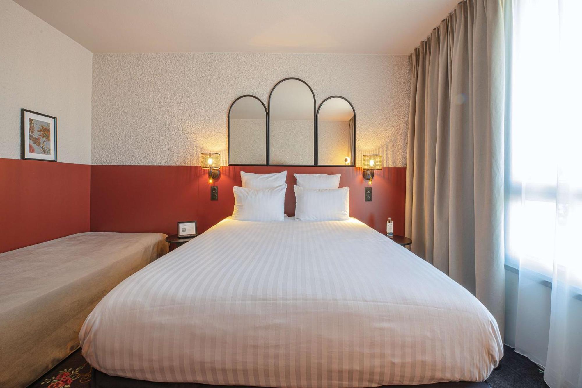 เบสต์ เวสเทิร์น แซ็ง-เอเตียน แอโรปอร์ Hotel อ็องเดรซิเยอซ์-บูเตยง ภายนอก รูปภาพ